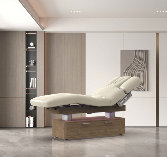 Table de soins réglable dans une salle de spa